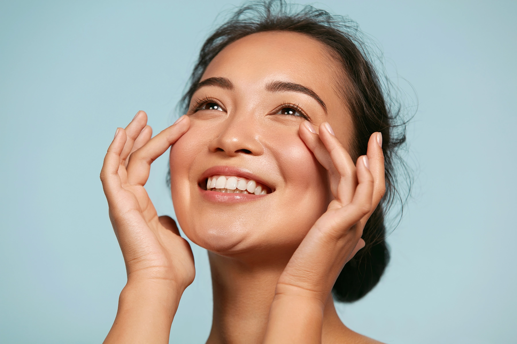woman smiling on blue background