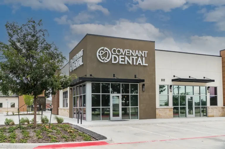 Exterior view of Covenant Dental clinic building and entrance.
